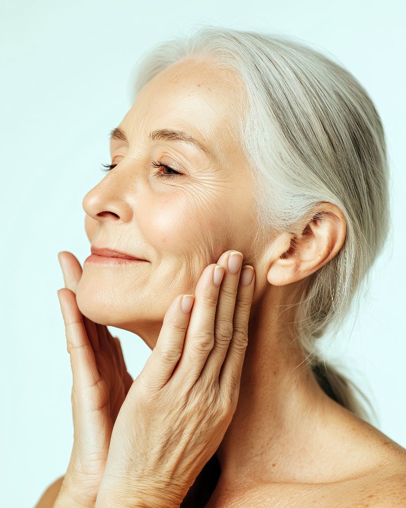 Older Women touching face