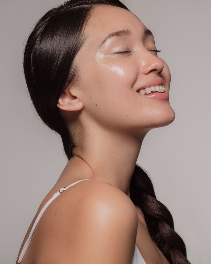 Woman with braided hair and great skin